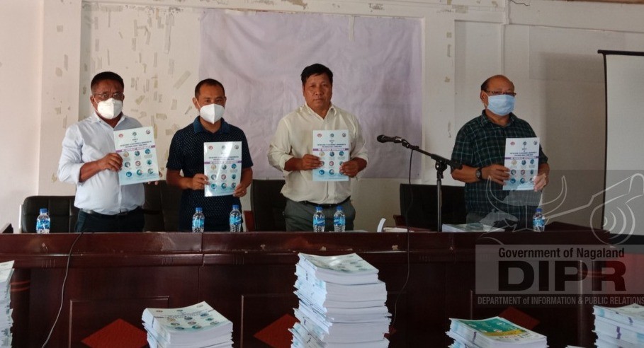 DRDA Mon released a translated booklet on SOP for COVID-19 containment & management in Peri-Urban, Rural and Tribal areas on August 5. (DIPR Photo) 